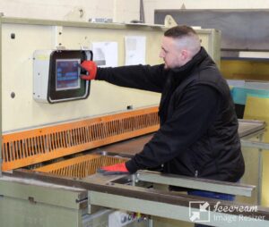 Guillotine cutting sheet metal to custom size at Metal Offcuts UK