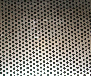 Aluminium perforated sheet with round holes in a staggered pattern, suitable for ventilation and screening