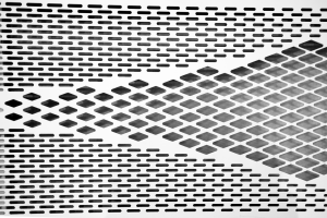 Examples of decorative laser cut perforated aluminium sheet patterns including slots and diamond shapes